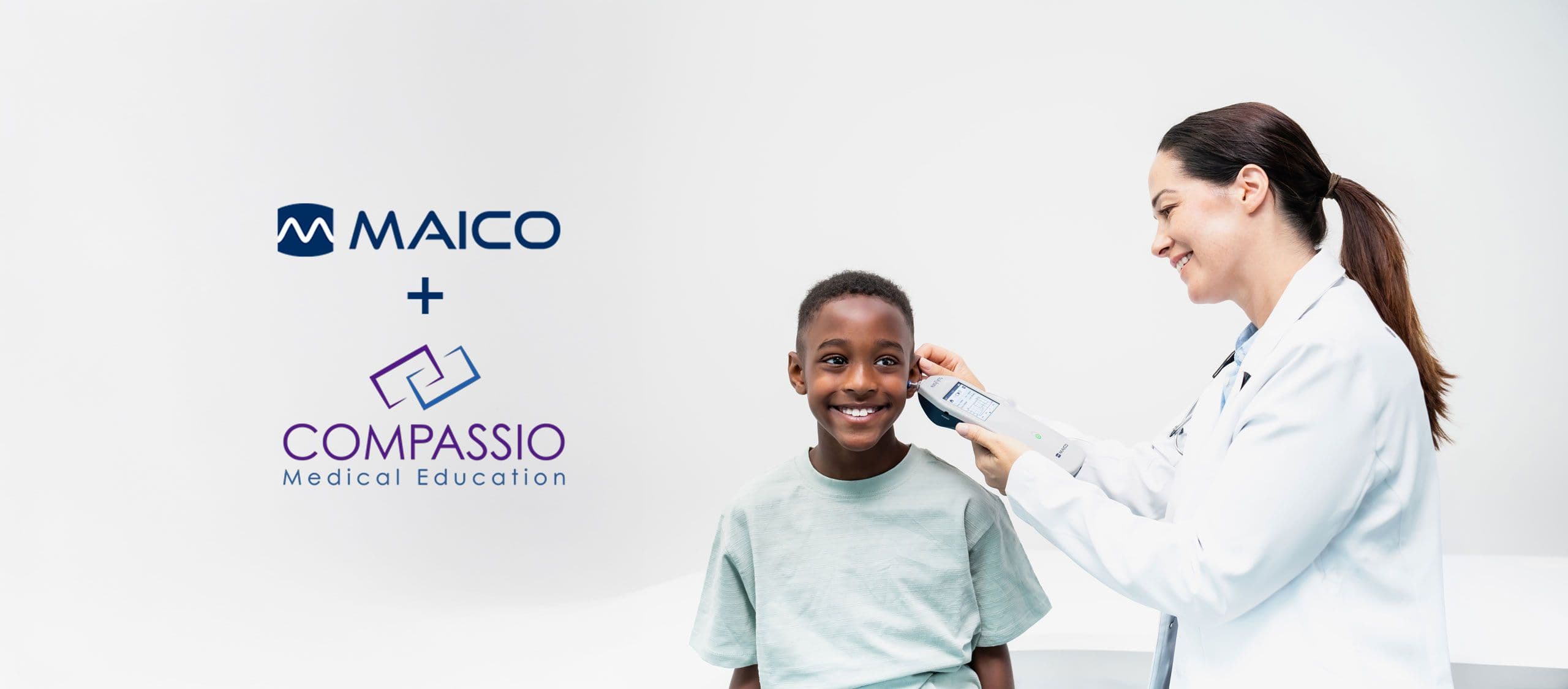 child gets a tympanometry test by female doctor